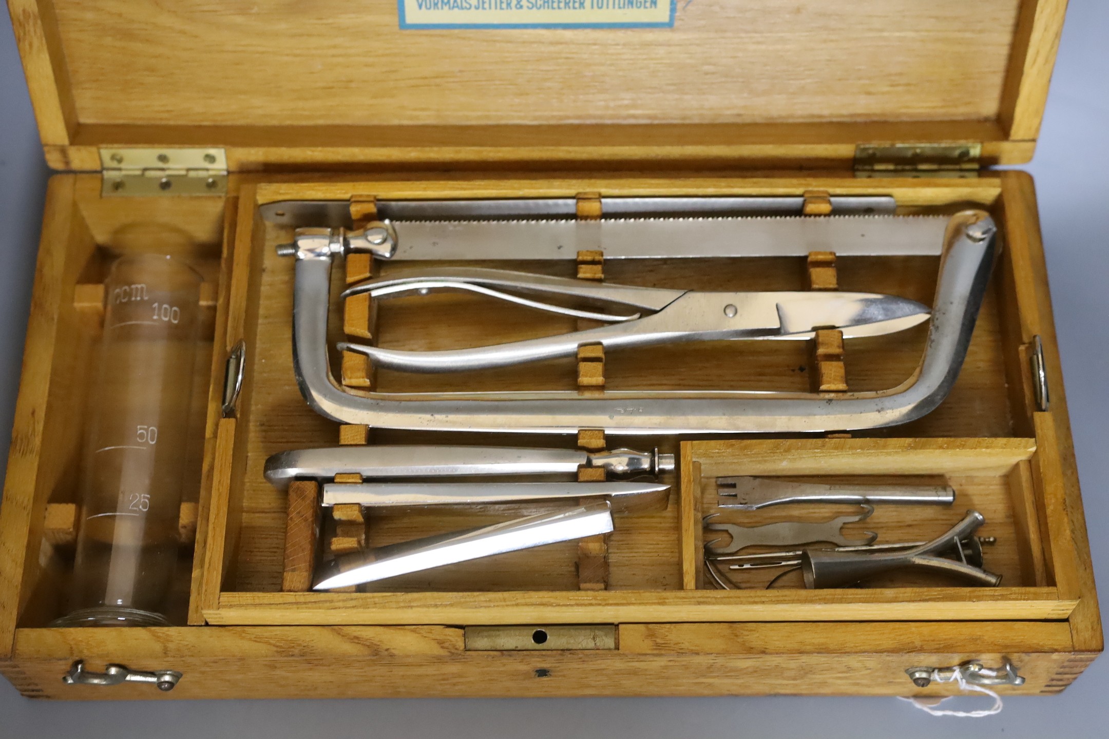 An Aesculap oak cased German autopsy kit